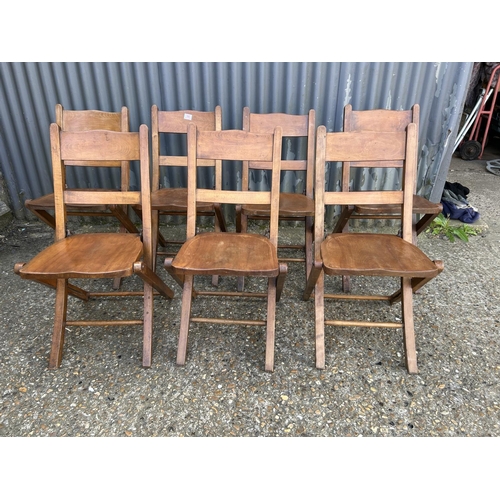 98 - A set of seven vintage folding chairs