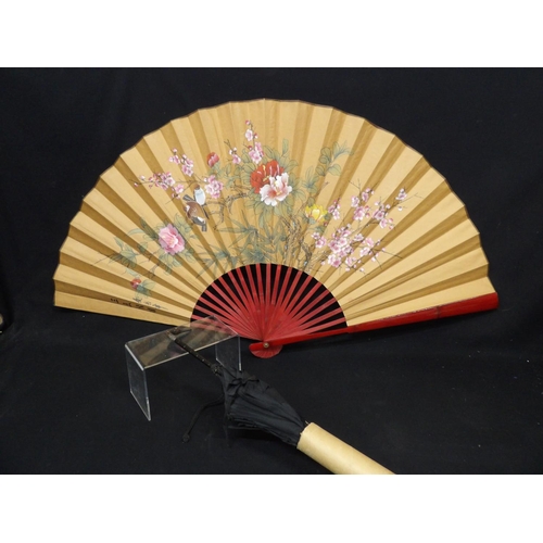 508 - Large oriental fan and silver mounted bird head parasol (Slightly perished)