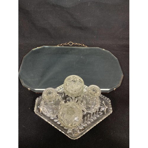 1065 - Frameless wall mirror and glass Trinket Set, (no damage)