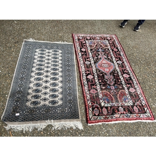 176 - Two oriental  pattern rugs