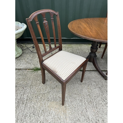 140H - A mahogany d-end dining table with four chairs