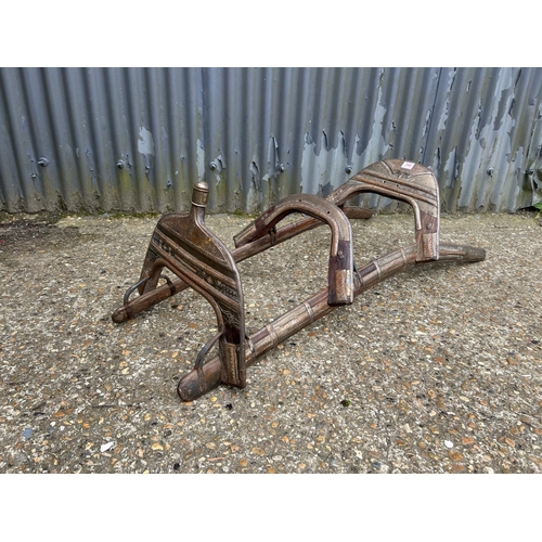 140L - An eastern antique brass mounted camel saddle