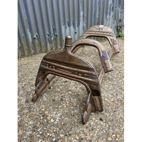 140L - An eastern antique brass mounted camel saddle