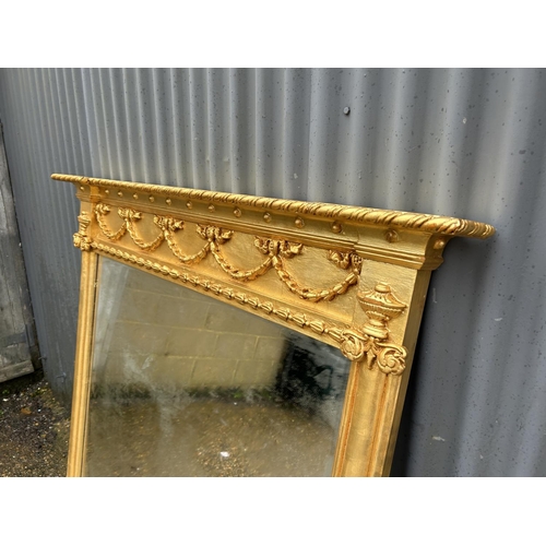 120B - A large regal gold gilt framed overmantel mirror 128 x 133