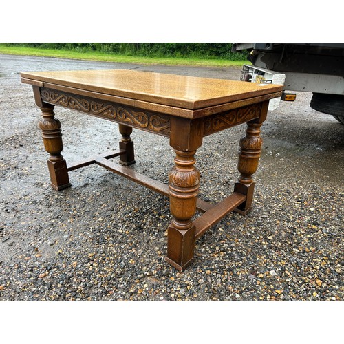 10A - An oak drawer leaf table  127x 77x 77