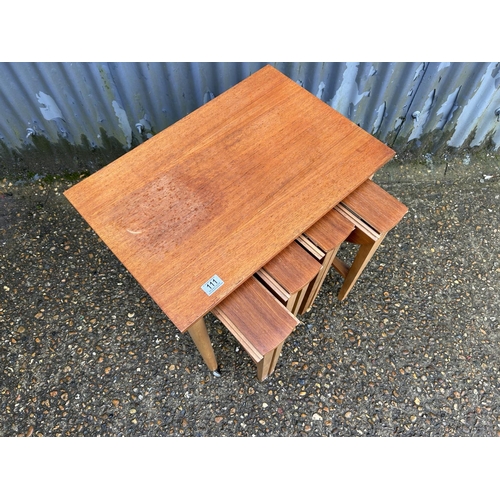 111 - A mid century teak nest of five tables