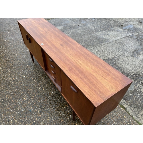 125 - A mid century g plan teak sideboard