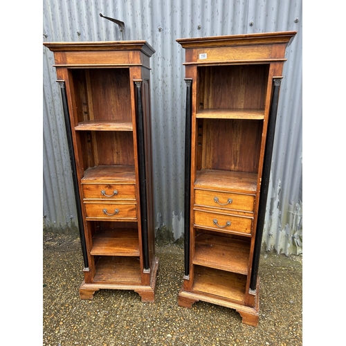 150 - A pair of hardwood open bookcases with two drawers and adjustable shelves 56x37x175