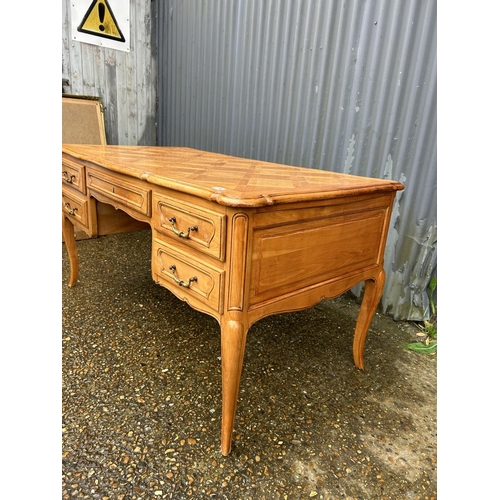 154 - A  large french desk with marquetry top 150x80x77