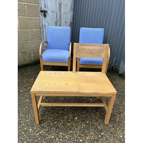 175 - A light oak hall seat together with two light oak framed chairs