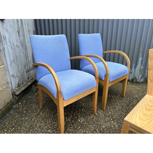 175 - A light oak hall seat together with two light oak framed chairs