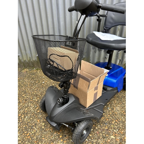 177 - A folding boot size mobility scooter in good working order fitted with brand new batteries