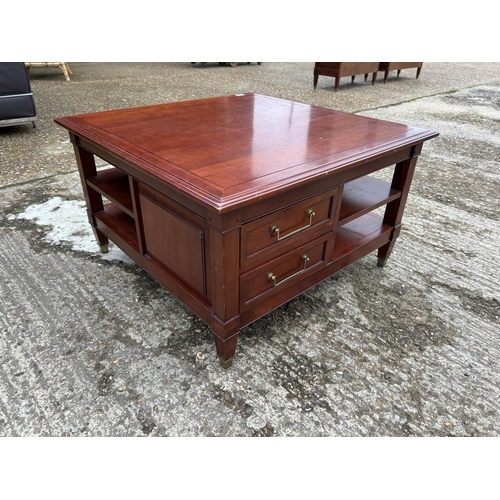 181 - A LAURA ASHLEY hardwood double sided coffee table with two drawers to each side 85x85x5