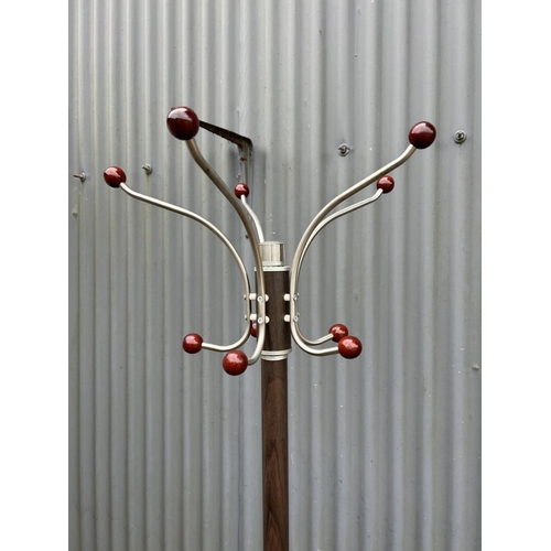 187 - A stylish coat stand with granite base