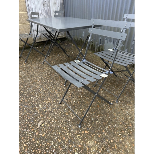 190 - A modern folding garden table and four folding chairs from 'Alice's garden' 110x70