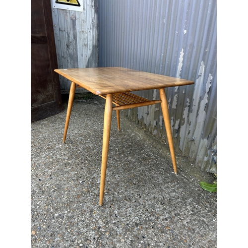 2 - An ercol light elm kitchen table 100x70x72