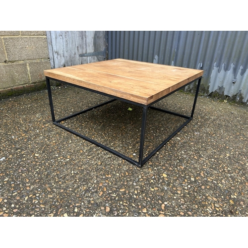 200 - A modern oak and metal framed coffee table 80x80x120