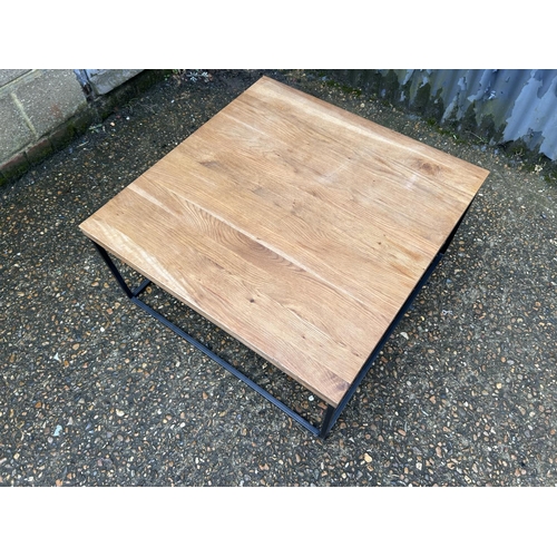 200 - A modern oak and metal framed coffee table 80x80x120