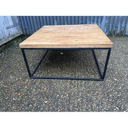 200 - A modern oak and metal framed coffee table 80x80x120