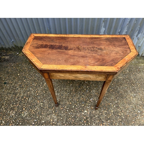 211 - A Victorian inlaid fold over card table with green baize top