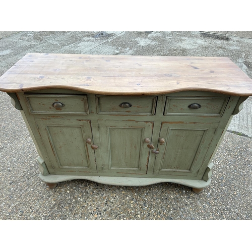 221 - A French pine three drawer sideboard, painted green 154x54x110