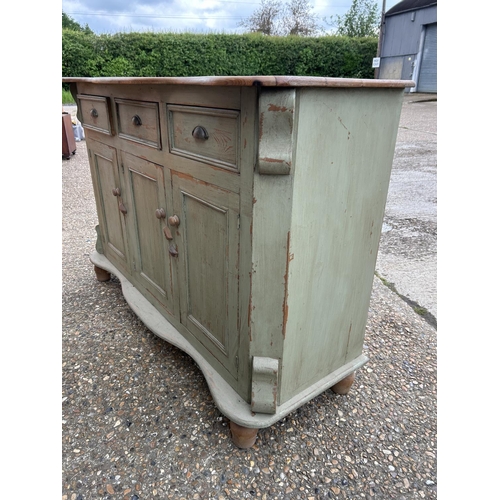 221 - A French pine three drawer sideboard, painted green 154x54x110