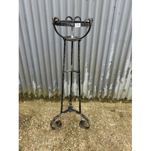 232 - An ornate iron plant stand 120cm tall