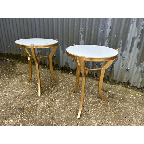 239 - A pair of gilt painted side tables with white glass tops