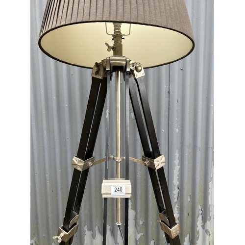 240 - A modern tripod floor standing tripod lamp with modern plug and new bulb