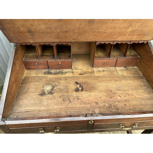 243 - A 19th century clerks  with two drawers and fitted interior  94x70x102