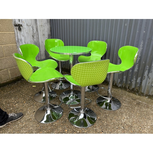 244 - A modern chrome and lime green bistro table with set of six matching chrome and green bar stools