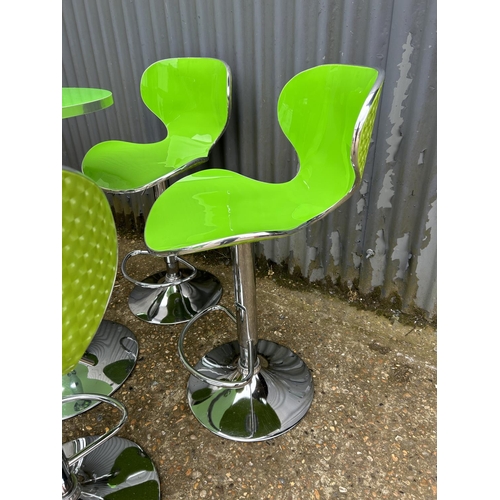 244 - A modern chrome and lime green bistro table with set of six matching chrome and green bar stools