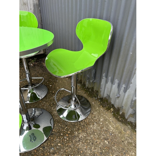 244 - A modern chrome and lime green bistro table with set of six matching chrome and green bar stools