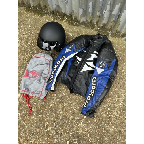 250 - leather biker jacket and crash helmet