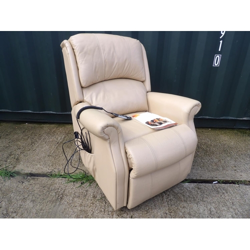 272 - A cream leather electric reclining armchair by CELEBRITY