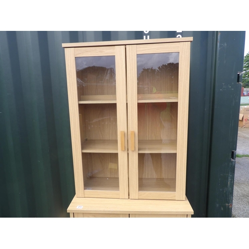 273 - A modern light oak effect bookcase cupboard 84x45x185