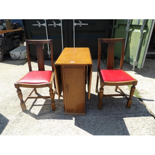 282 - Oak gateleg table and two chairs