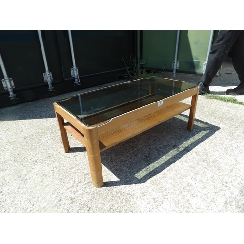 285 - Mid century teak coffee table with smoked glass top