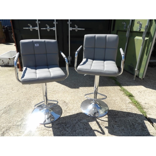 295 - A pair of chrome and grey gas lift bar stools