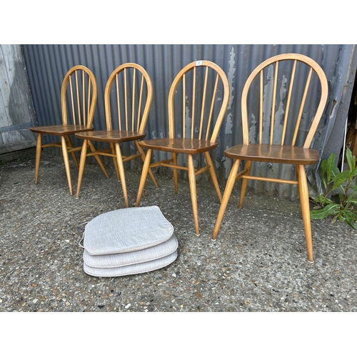 3 - A set of four ercol stick back chairs (with three seat pads )