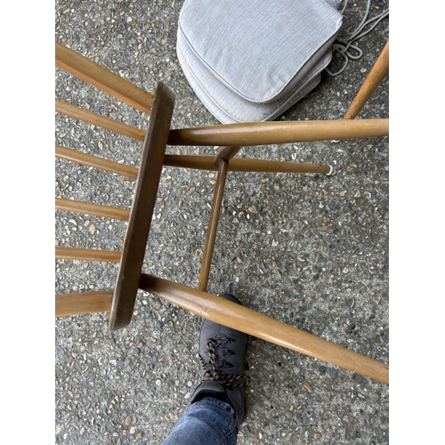 3 - A set of four ercol stick back chairs (with three seat pads )