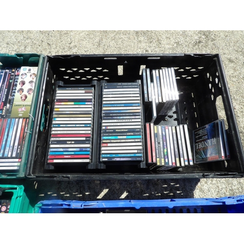 306 - Six trays of ASSORTED CDS AND DVDS (crates not included)