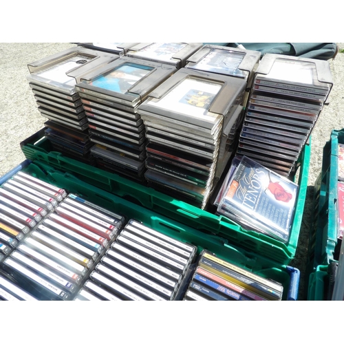 306 - Six trays of ASSORTED CDS AND DVDS (crates not included)