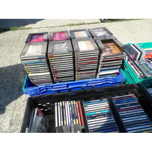 306 - Six trays of ASSORTED CDS AND DVDS (crates not included)