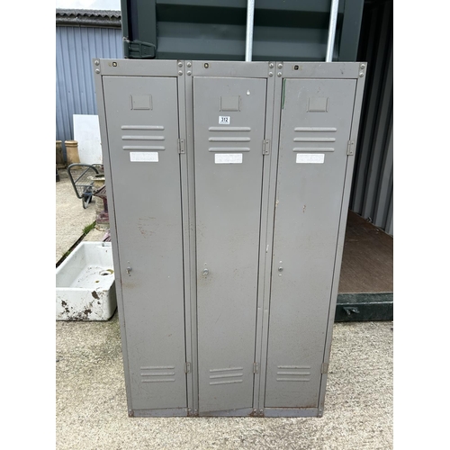 312 - A vintage triple locker with key 92x38x152