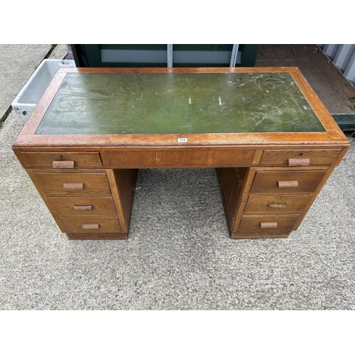 314 - A early 20th century oak twin pedestal desk 135cm wide