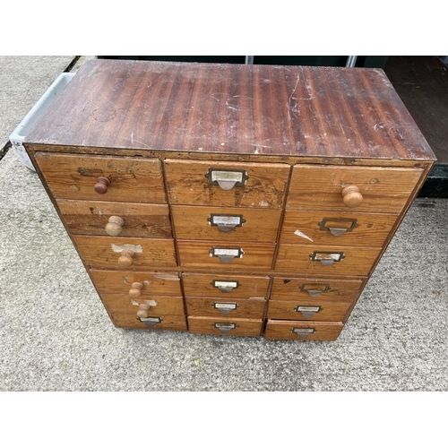 315 - A pine chest of 18 filing drawers 89x46x90