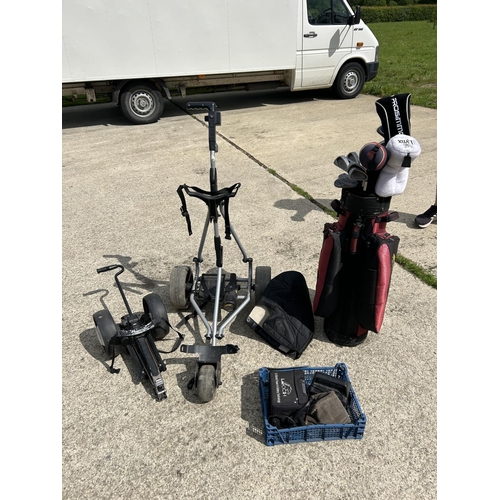 323 - A set of Wilson ladies golf clubs, power caddy, trolley and barrow with charger