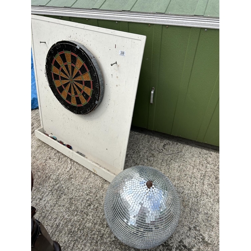 330 - Dart board and disco ball