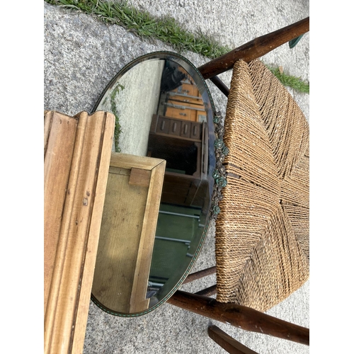 336 - A country pine wall shelf together with frameless mirror and two rush seat chairs